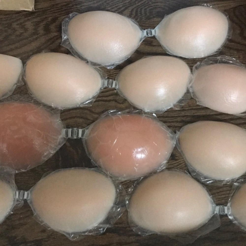 Adhesive silicone bra coverings